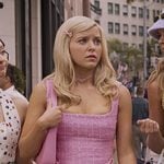 Elle's pink tweed mini dress with chain belt on Elle