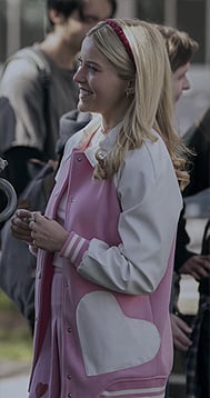 Elle’s pink varsity jacket with heart pockets on Elle