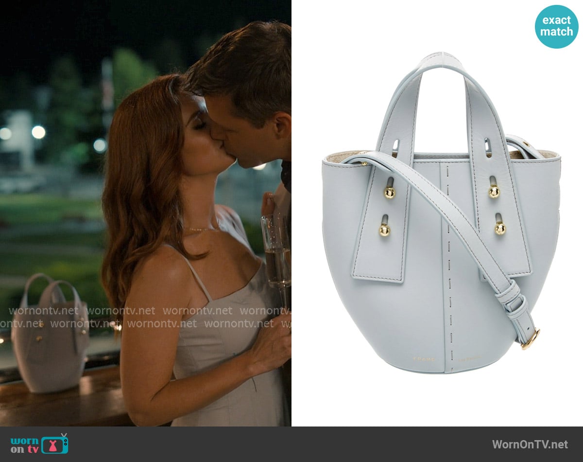 Frame Leather Bucket Bag worn by Maddie Townsend (JoAnna Garcia Swisher) on Sweet Magnolias