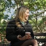 Georgina’s black quilted hooded coat on In The City