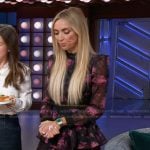 Giuliana Rancic’s black floral ruffle mini dress on The Kelly Clarkson Show