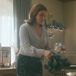 Hannah’s gray wrap sweater and coat on Off Campus