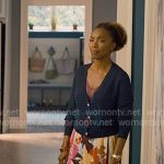 Helen’s navy open knit cardigan and floral pants on Sweet Magnolias