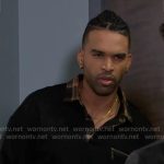Izaiah’s black and plaid polo sweater on Beyond the Gates