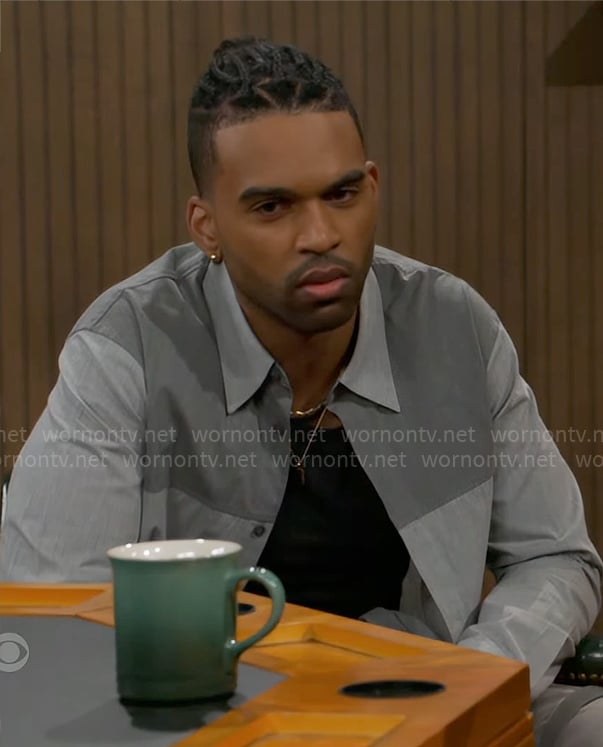 Izaiah’s grey colorblock shirt on Beyond the Gates