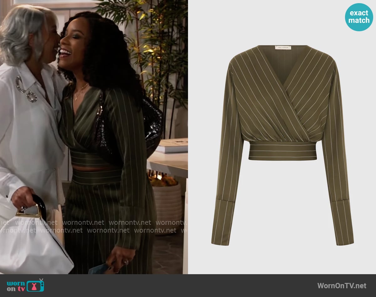 Jaki Zoe Pinstripe Elastic Wrap Satin Top worn by Naomi Hamilton Hawthorne (Arielle Prepetit) on Beyond the Gates