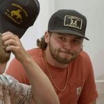 Jesse’s red logo patch pocket tee on The McBee Dynasty Real American Cowboys