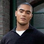 Kai's black textured polo shirt on General Hospital
