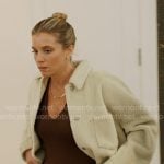 Katie’s brown bodysuit and white fleece jacket on In The City
