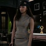 Kat’s plaid top and skirt set with RB cap on Beyond the Gates