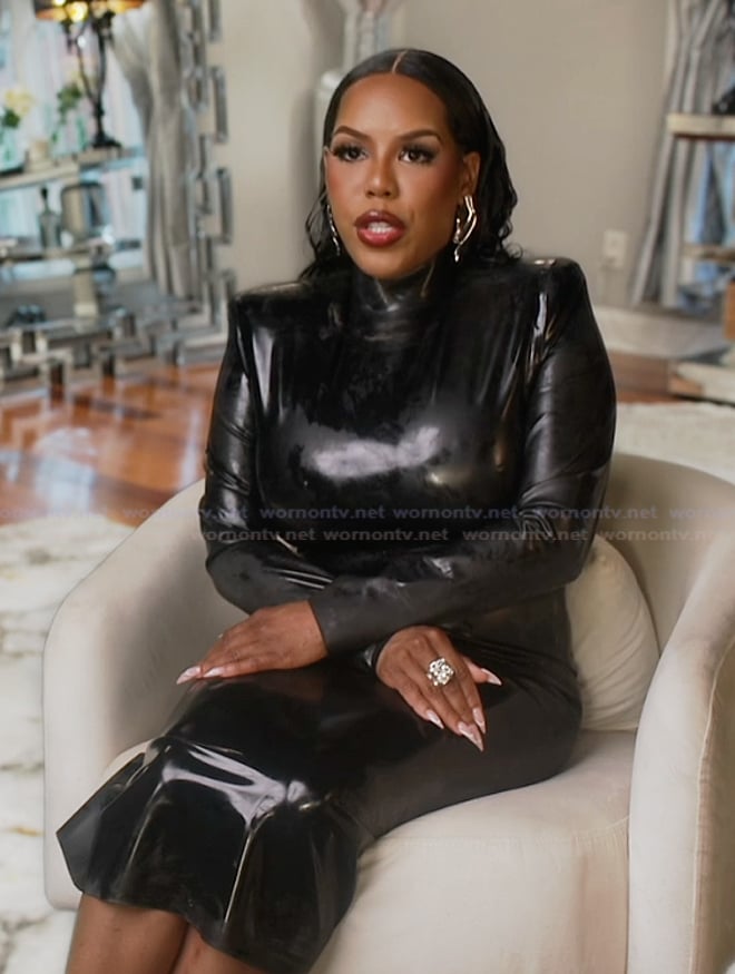 Kelli’s black leather confessional dress on The Real Housewives of Atlanta