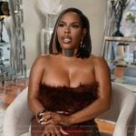 Kelli’s burgundy leather confessional dress on The Real Housewives of Atlanta