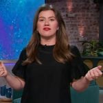 Kelly’s black ruffle hem mini dress on The Kelly Clarkson Show