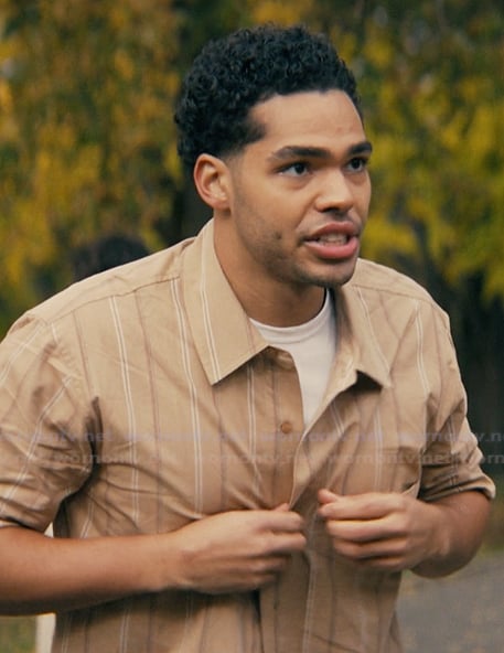 Kel’s beige striped shirt on Not Suitable For Work