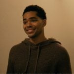 Kel’s brown knit hoodie on Not Suitable For Work