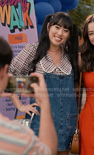 Lily’s brown plaid blouse and denim pinafore dress on Sweet Magnolias