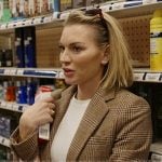 Lindsay’s brown plaid blazer on In The City
