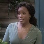 Naomi's green active jacket on Beyond the Gates