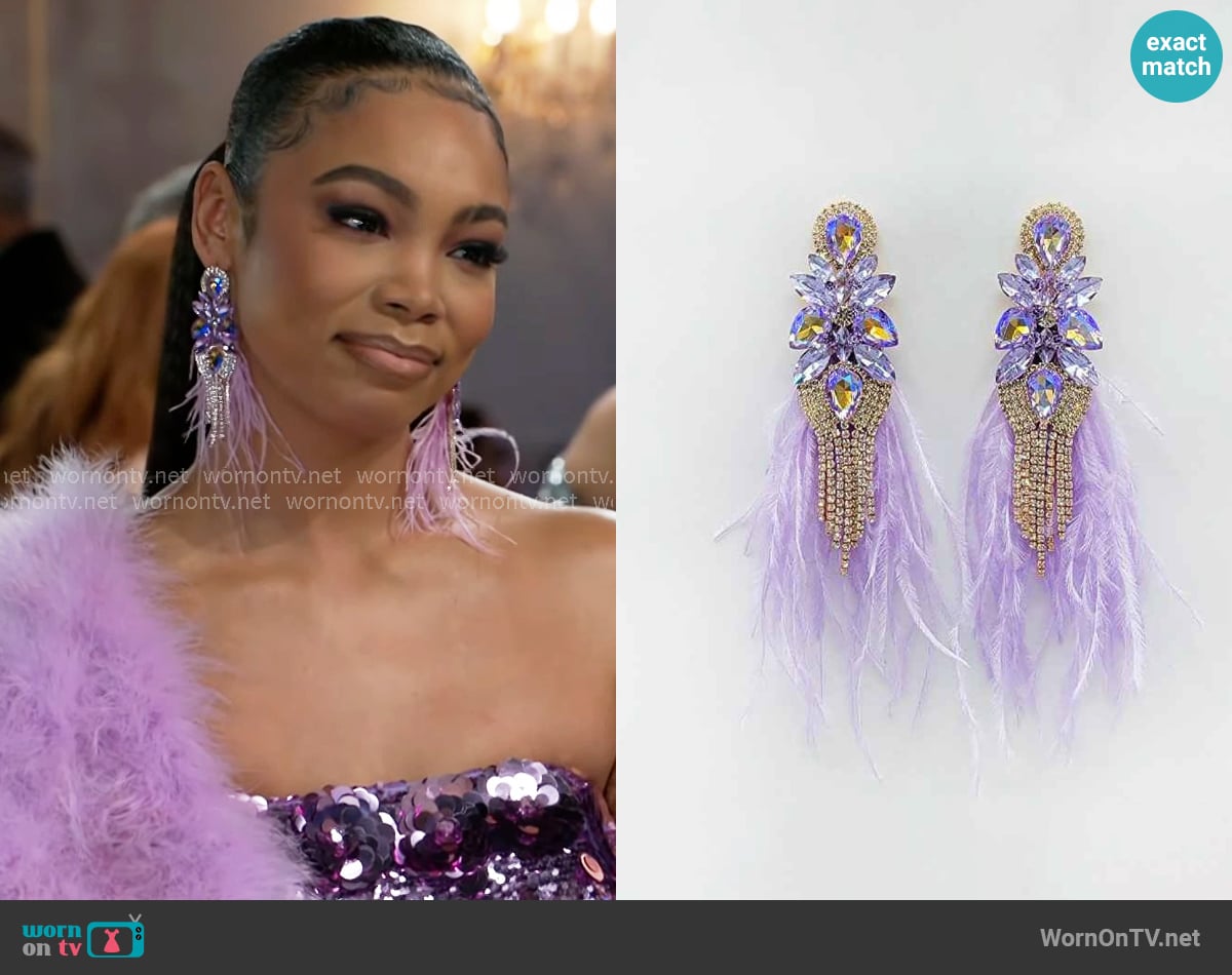 Paparazzi Ready Feather Luxe Earrings in Lavender worn by Chelsea Hamilton (RhonniRose Mantilla) on Beyond the Gates