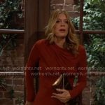 Phyllis’s rust brown draped top and metallic clutch on The Young and the Restless