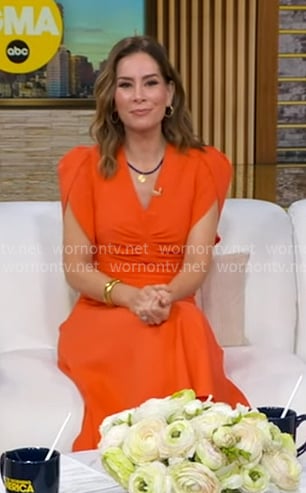 Rebecca Jarvis’s orange ruched front dress on Good Morning America