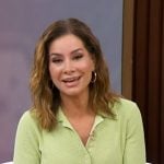 Rebecca’s green knit polo and white floral skirt on Good Morning America