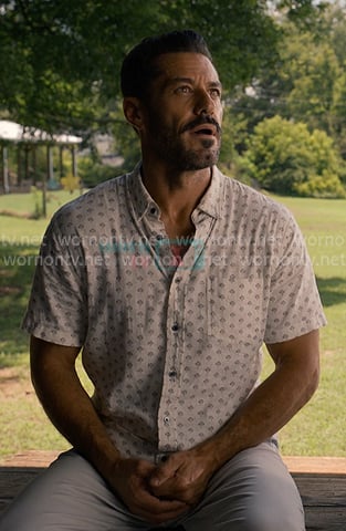 Ronnie’s white printed short sleeve shirt on Sweet Magnolias