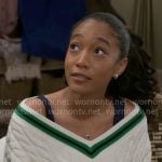 Samantha's white sweater with green stripe trim on Beyond the Gates