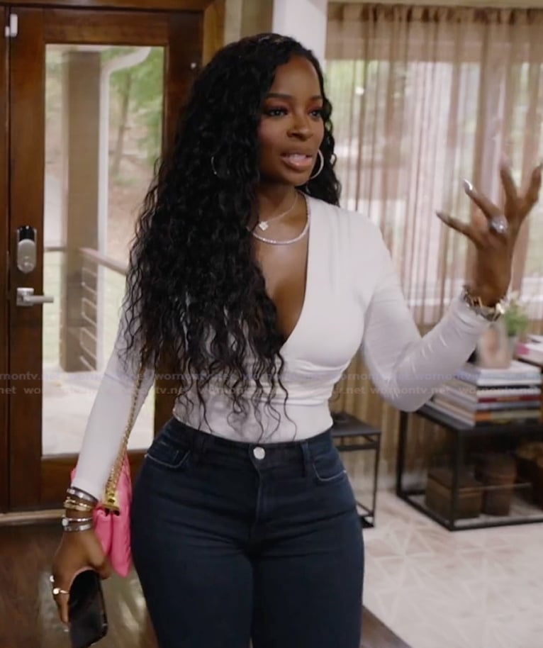 Shamea white wrap bodysuit on The Real Housewives of Atlanta