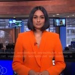 Shanelle Kaul’s orange shawl collar blazer on CBS Evening News