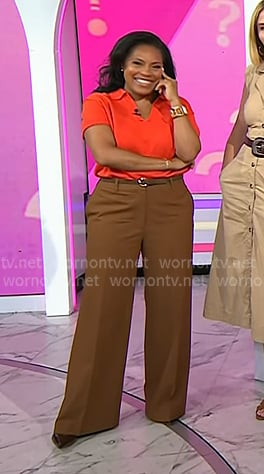 Sheinelle’s red polo sweater and brown pants on Today