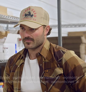Steven’s brown plaid button down shirt on The McBee Dynasty Real American Cowboys