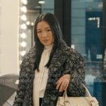 Vanessa’s black lace coat on Not Suitable For Work