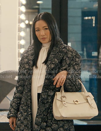 Vanessa’s black lace coat on Not Suitable For Work