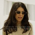 Yvonne’s gold flame sunglasses on In The City