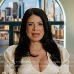 Yvonne’s ivory v-neck confessional dress on In The City