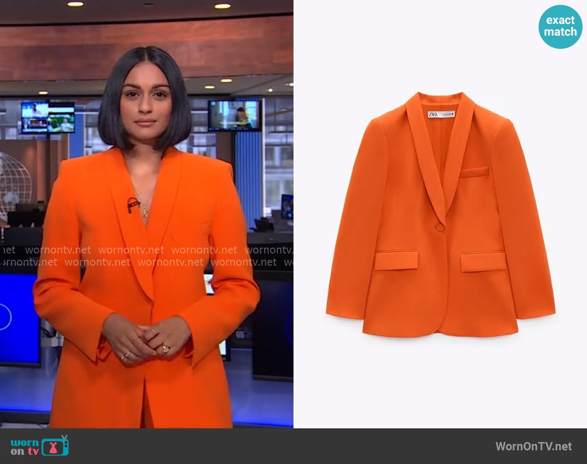 Zara Belted Tuxedo Collar Blazer in Orange worn by Shanelle Kaul on CBS Evening News