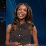Zuri's brown pleated vest on Access Hollywood