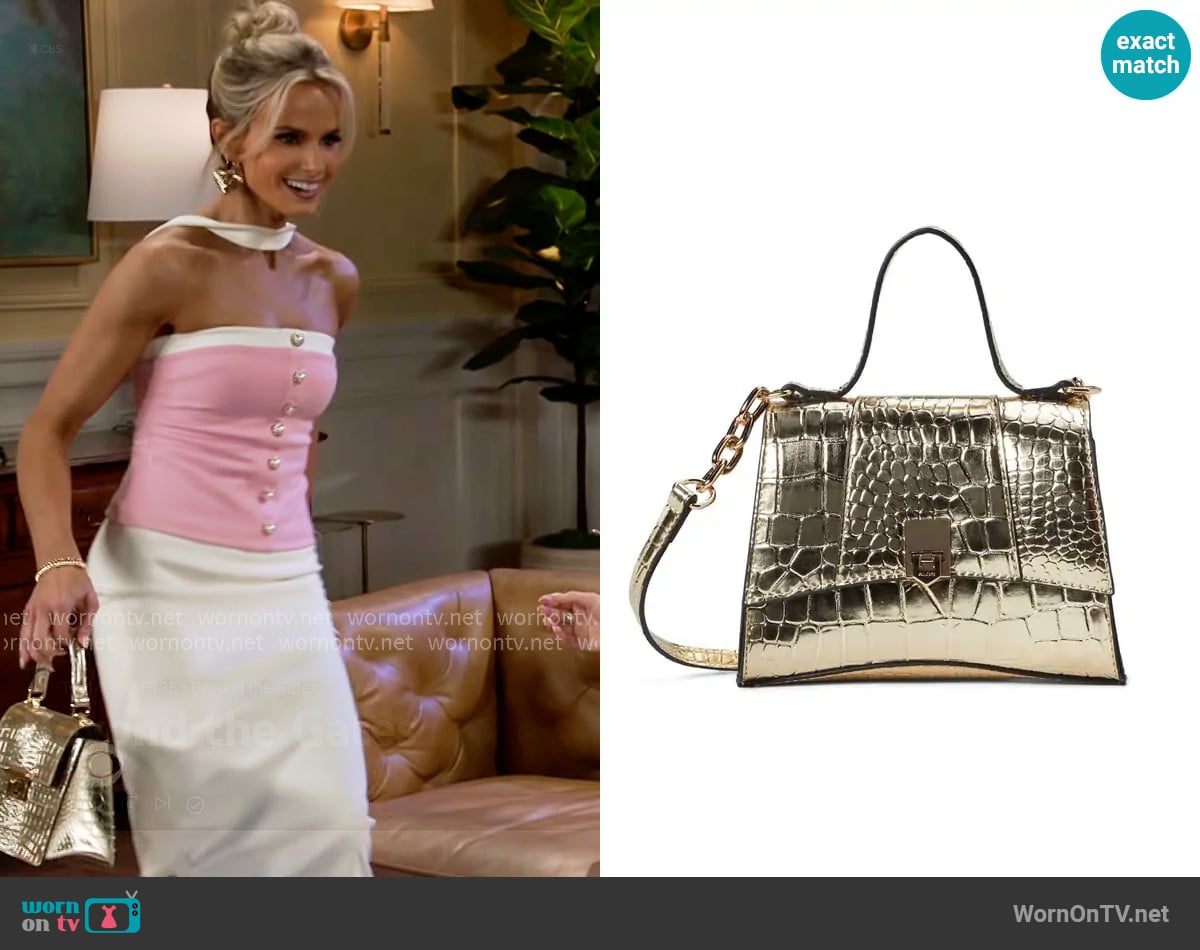 Aldo Attunga Bag worn by Vanessa McBride (Lauren Buglioli) on Beyond the Gates
