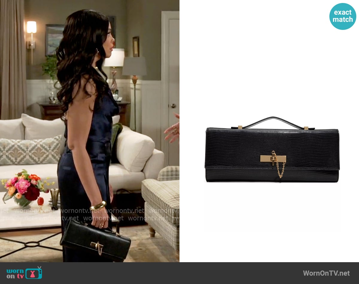 Aldo Roux Clutch Wallet worn by Dani Dupree (Karla Mosley) on Beyond the Gates