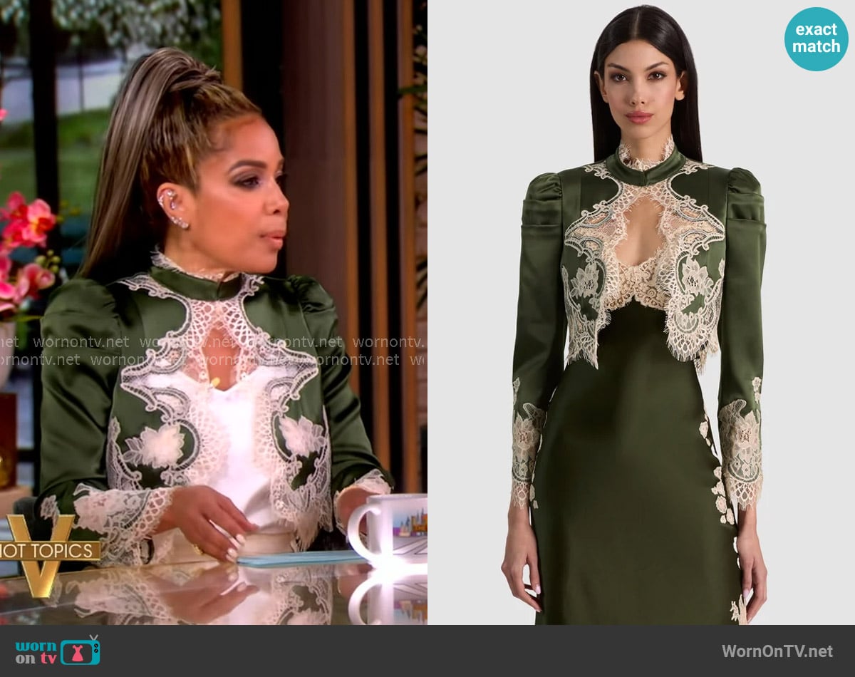 Sunny’s green lace trim jacket on the View