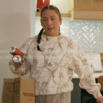 Alli’s white printed sweatshirt on The McBee Dynasty Real American Cowboys
