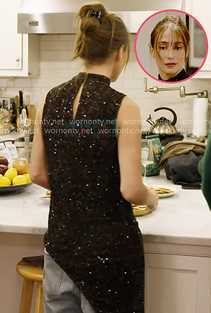Amanda’s black sequin sleeveless knit top on In The City