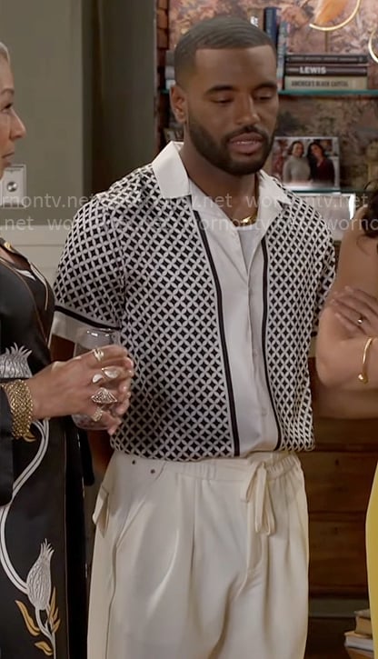 Andre’s black and white geometric print shirt on Beyond the Gates
