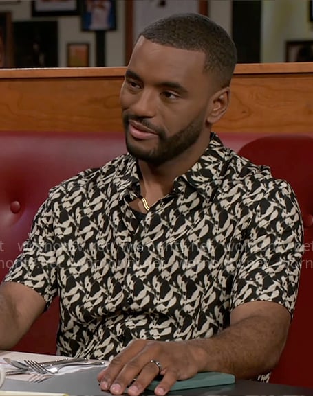 Andre’s black and white printed shirt on Beyond the Gates