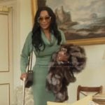 Angela's green cowl neck dress on The Real Housewives of Atlanta