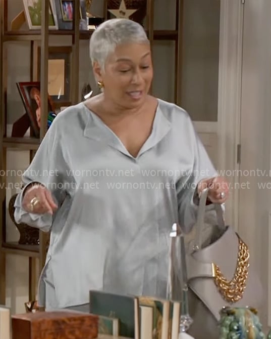 Anita’s silver blouse on Beyond the Gates
