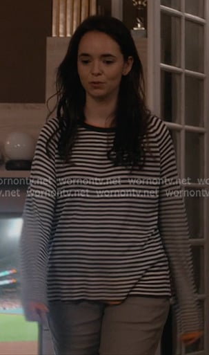 Annabelle’s black striped top with orange trim on Paris is Always a Good Idea
