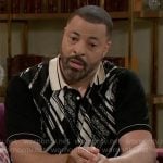 Bill’s black and white printed polo shirt on Beyond the Gates