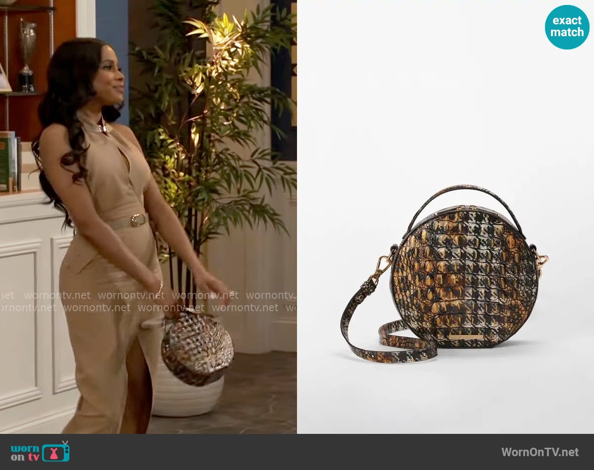 Brahmin Lane Bag in Untamed Melbourne worn by Hayley Lawson (Marquita Goings) on Beyond the Gates